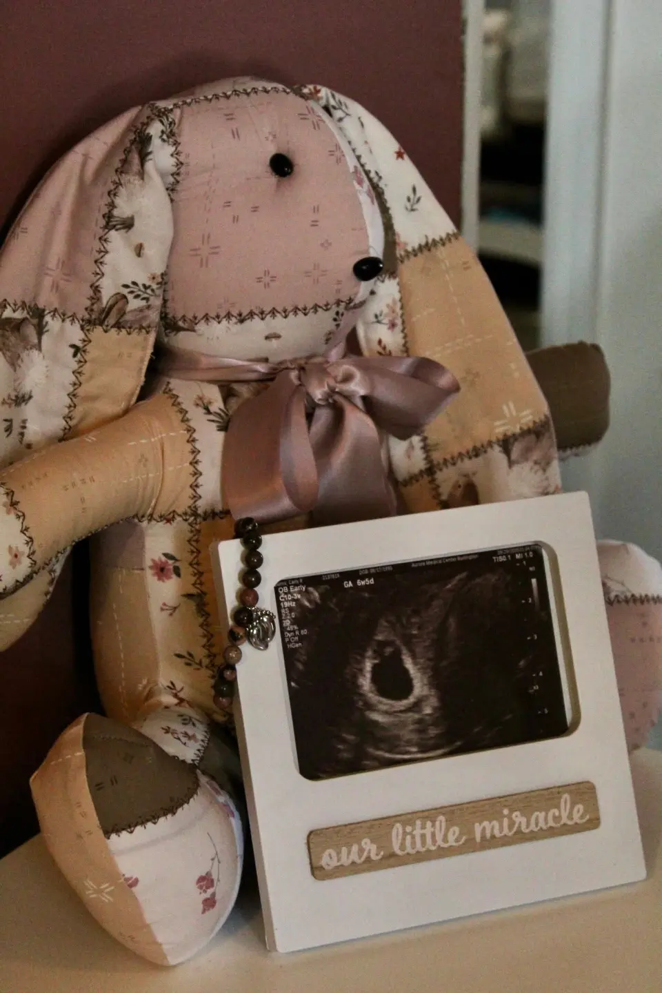 Newborn details photographed with a family heirloom